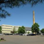 View of Townhouse and smokestack from south end of Parking Lot C