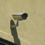 Security cameras in common areas inside building and outside